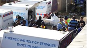 פינוי ההרוגים מהמועדון, צילום: רויטרס